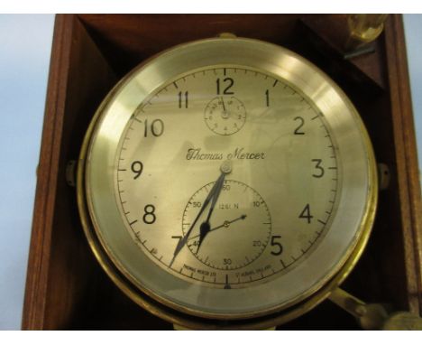 Thomas Mercer, eight day marine chronometer, the silvered dial with Arabic numerals and housed in a teak case