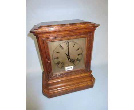 Early 20th Century oak cased bracket clock, the silvered dial with Roman numerals, signed Doyle and Co., the two train moveme