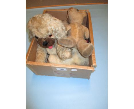 Small jointed teddy bear, a straw stuffed figure of a lamb and a pyjama case, figure of a dog