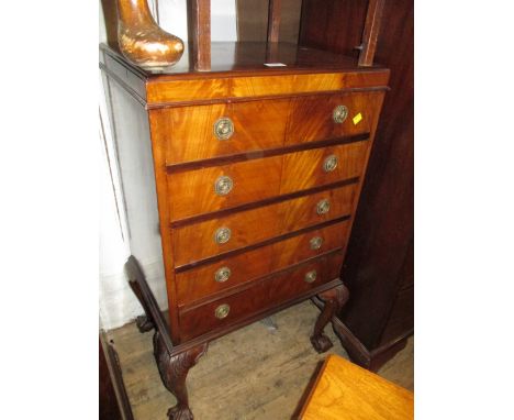 Mid 20th Century mahogany and crossbanded music cabinet, the caddy top above five drop fronted drawers with circular brass ri