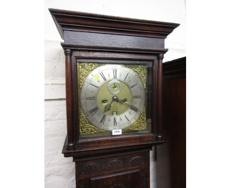 18th Century oak longcase clock, the square hood with flanking pilasters above a rectangular panelled door and conforming pli