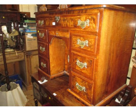 19th Century burr walnut and herringbone crossbanded kneehole desk having an arrangement of drawers with brass swan neck hand