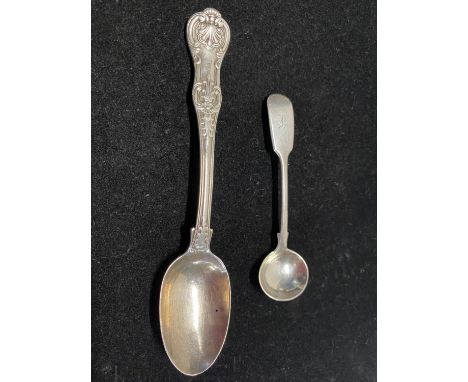 A hallmarked silver 1863 silver small caddy spoon and a hallmarked for London silver spoon dated 1870, total weight 43g 