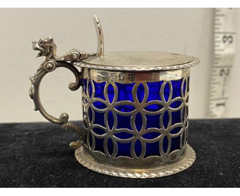 A hallmarked for London 1893 silver mustard pot with blue glass liner, net weight of silver 63g, maker Edward Hutton 