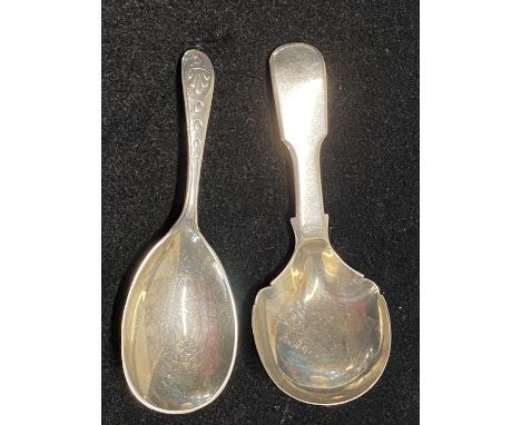 Two hallmarked silver caddy spoons assorted makers, total weight 25g 