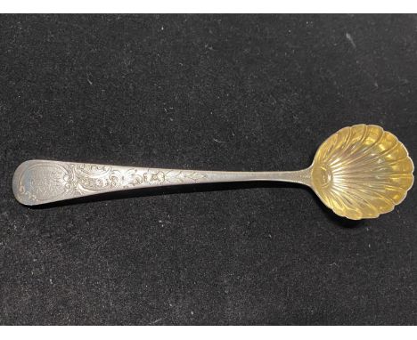 A hallmarked for London 1873 silver ladle with gilt bowl and monogram to handle, maker John Blake, 32g 
