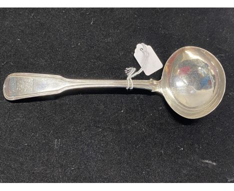 A hallmarked for Dublin 1810 silver ladle with family crest to handle (possibly related to The Baskerville family), maker Sam