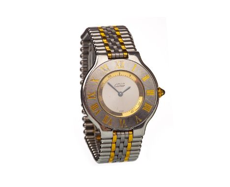 LADY'S MUST DE CARTIER 21 STAINLESS STEEL BI COLOUR QUARTZ WRIST WATCH, the round silver coloured dial lacking numerals, blue