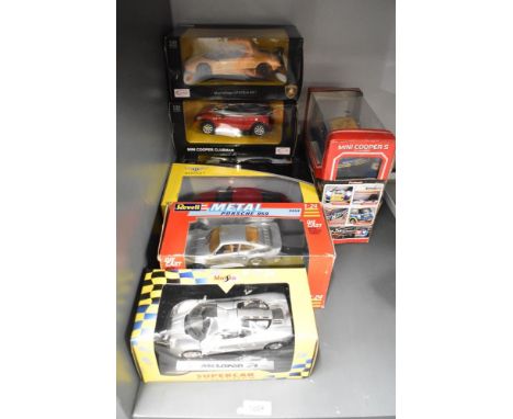 Seven 1:24 scale Die-casts, Rastar BMW X6, Mini Cooper Clubman and Lamborghini, Revell Poreche 959, Maisto Mclaren F1, Braha 