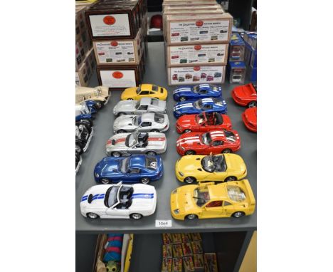Twelve Burago 1:24 scale Die-casts, Ferrari F40, Dodge Viper RT10, Dodge Viper Coupe in red with white stripe, blue, grey and