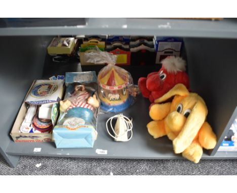 A shelf of mixed toys including Bendy Toys Dependable Bendy Bulls Eye in original display box, two Kodak Kolorkins Soft Toys 