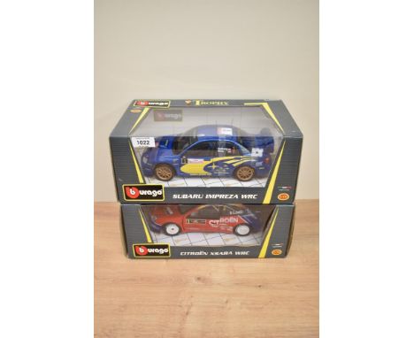 Two Burago 1:18 scale Trophy Collection Die-casts, 39053 Subaru Impreza WRC and 39044 Citroen Xsara WRC, both boxed with inte