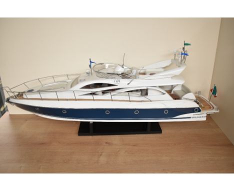 A wooden and plastic scale model, Sunseeker Italian Cabin Cruiser, on fitted stand, length 87cm
CONDITION REPORT
No major fau