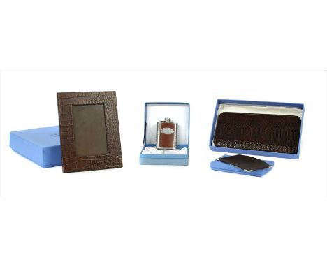 A collection of Smythson items in their original boxes , to include a photograph frame, passport holder, card holder and note