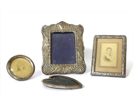 Four silver easel back photograph frames , various dates, largest 23 x 17.5cm (4)