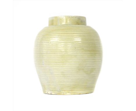 A Moorcroft ribbed vase, of ovoid form, in a pale cream glaze, 29cm high