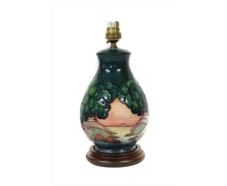 A Moorcroft tubeline decorated 'Mamoura' pattern table lamp, of baluster form, c. 1992 by Sally Tuffin, 29cm high