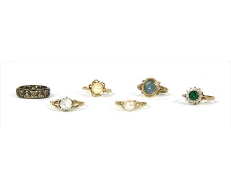 Six gold rings, to include two cultured pearl rings, an opal triplet ring, a synthetic spinel ring and a synthetic spinel tri