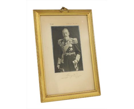 A photographic portrait of George V, by Vandyk, 41 Buckingham Palace Rd, SW1, signed on the mount 'George R, 1935', in a gilt