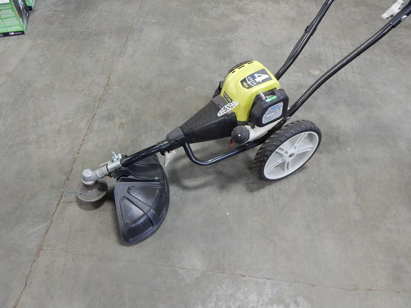 RYOBI MODEL T430 4CYCLE GAS POWERED WHEELED TRIMMER