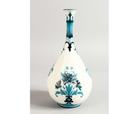 A HADLEY WORCESTER FINE ART NOUVEAU TEAR DROP SHAPED VASE painted in shades of blue, Hadley Faience mark.