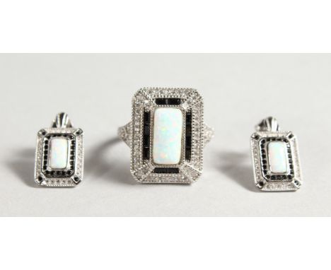 A SILVER AND GILSON OPAL DECO STYLE RING.