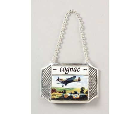 A SILVER PLATED DECANTER LABEL "COGNAC" enamel decorated with a Spitfire.