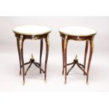 A GOOD PAIR OF LOUIS XVITH DESIGN FRENCH CIRCULAR MARBLE TOP TABLE with ormolu mounts, curving