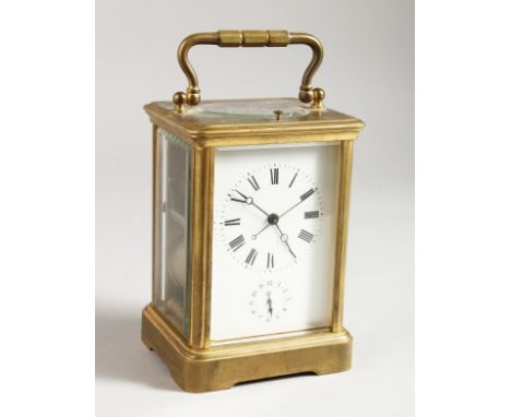 A 19TH CENTURY FRENCH BRASS ALARM REPEAT CARRIAGE CLOCK. 5ins high.