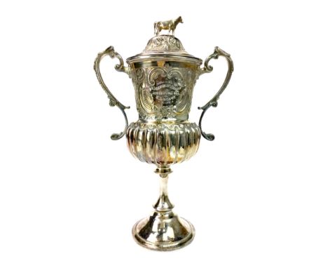 EDWARD VII SILVER PLATED AGRICULTURAL SOCIETY TROPHY, the cover with cow motif finial, the twin handled cup with central pres