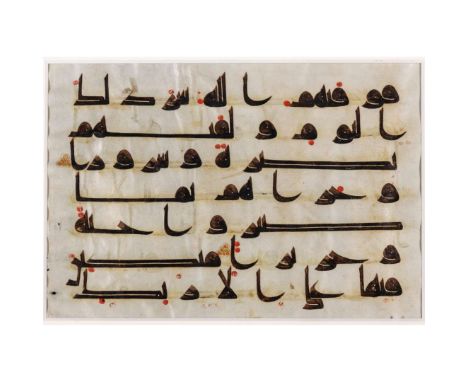  A KUFIC QUR'AN LEAF ON VELLUM NEAR EAST OR NORTH AFRICA, 9TH/ 10TH CENTURY Arabic manuscript on vellum, seven lines to the p