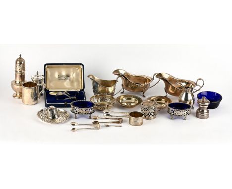 Sugar castor, two cream jugs, two gravy boats, pair of open salts with pierced decoration, mustard pot, two small presentatio