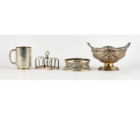 George V embossed silver plate ring, London 1920, pierced and embossed basket, Chester 1926, christening mug with engraved de