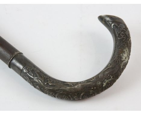 Chinese silver walking stick handle embossed and chased with two dragons among clouds flanking five character marks, makers m