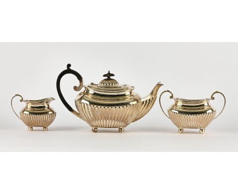Three piece half reeded tea service on ball feet, by James Dixon & Sons Ltd,Sheffield 1922, gross weight 20ozt 629gm