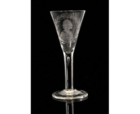 An 18th Century wine glass circa 1740, funnel bowl engraved with a portrait of William of Orange within laurel leaf garlands 