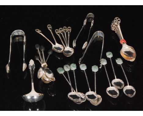 A set of eight Hong Kong silver teaspoons with carved jade style hard stone finials, six hallmarked silver coffee bean spoons