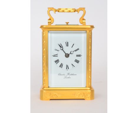 A 20th Century gilt cased carriage clock by Charles Frodsham London with push button repeat and strike, white enamelled dial 