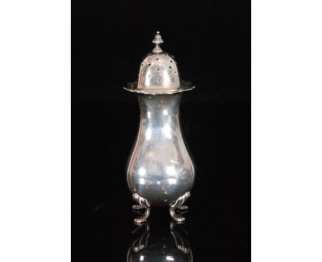 An Edwardian hallmarked silver sugar castor of square baluster form, with cut edge collar, pierced cover and baluster finial,