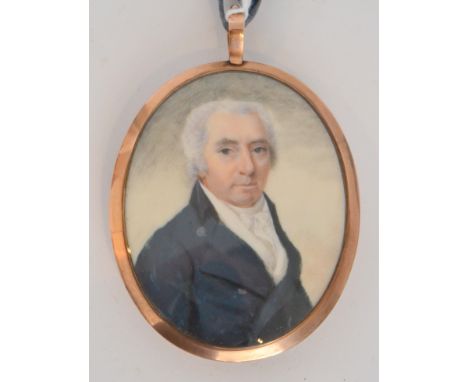 ENGLISH SCHOOL (CIRCA 1800) - Portrait of a gentleman wearing a blue top coat, half length, a miniature on ivory, the reverse