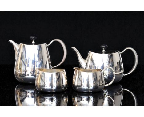 A mid 20th Century hallmarked silver four piece tea service, 'Pride', designed by David Mellor for Walker and Hall comprising