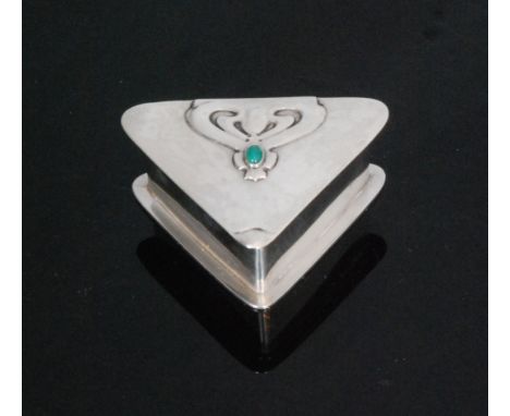 An Art Nouveau hallmarked silver triangular box, the hinged lid with applied stylised heart motif highlighted by a collar set