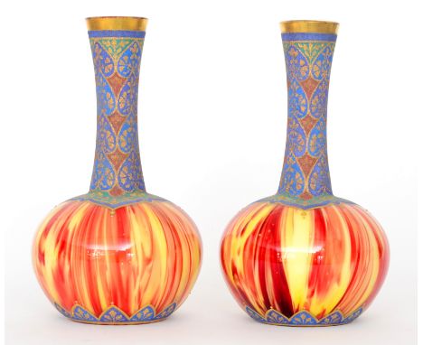 A pair of late 19th Century Loetz Carneol Ware vases of globe and shaft form decorated in the Persian taste with an enamelled