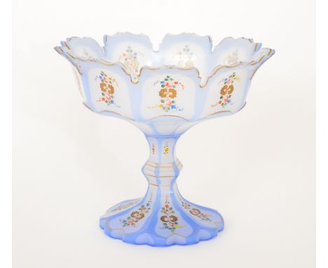 A 19th Century Bohemian pedestal bowl of shallow circular form with a fluted rim above a facet and knopped stem and petal edg