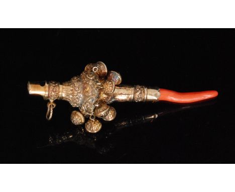 An early 19th Century silver gilt baby's teething rattle, plain whistle above lobed body with profusely engraved foliate deco