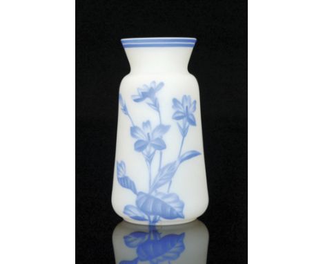 A small late 19th Century Harrach cameo glass vase of tapered sleeve form with flared rim, cased in blue over opal and cut wi