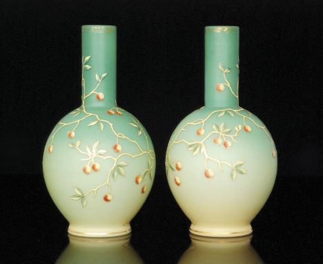 A pair of late 19th Century Harrach vases of globe and shaft form, each enamel decorated with fruiting boughs over a graduate