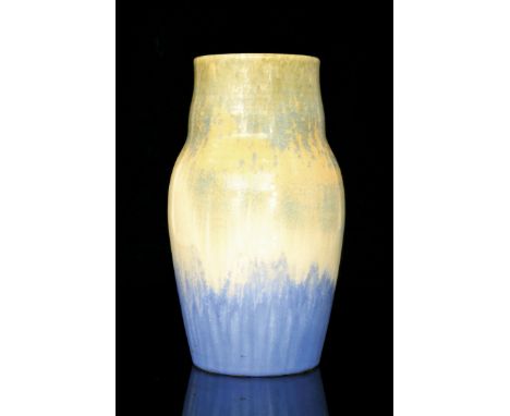 A Ruskin Pottery crystalline glaze vase of shouldered form decorated with a pale blue to cream to pale blue glaze with traili