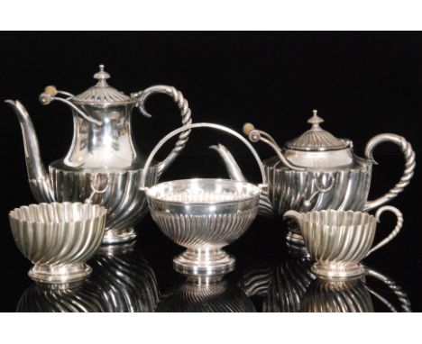 A late Victorian electroplated five piece tea service, each with wrythen fluted decoration and engraved 1892, unmarked (5)
