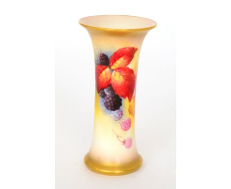 A Royal Worcester Graingers shape 323 trumpet vase decorated by Kitty Blake with autumnal fruit and berries, puce mark with d